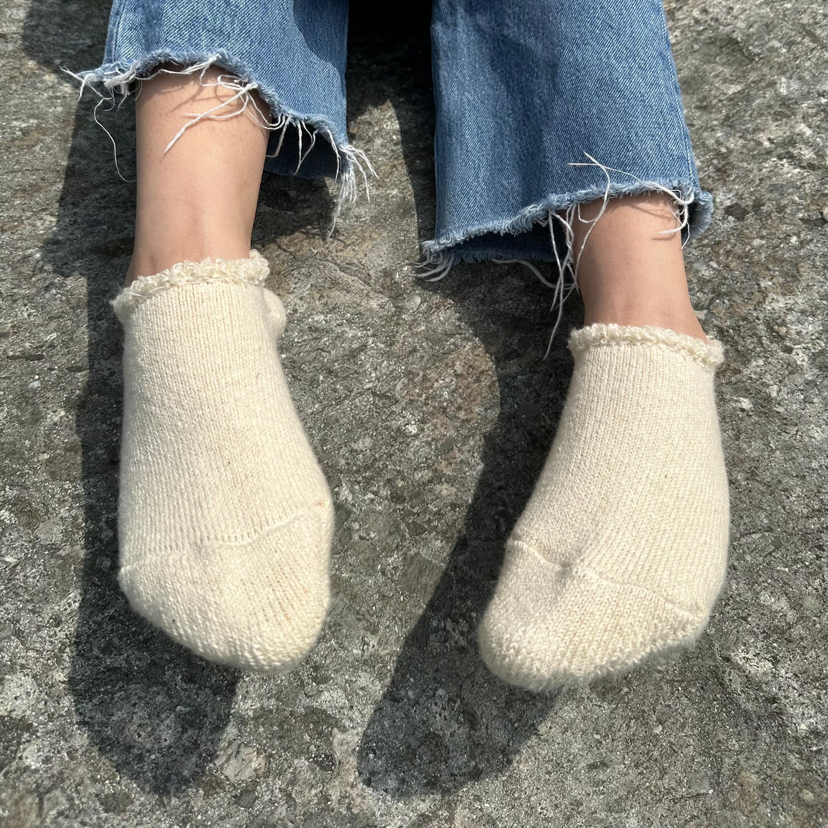 Airy Grace Organic Cotton Slipper Socks with Fuzzy Trim. Moisture-absorbing and heat-retaining properties.