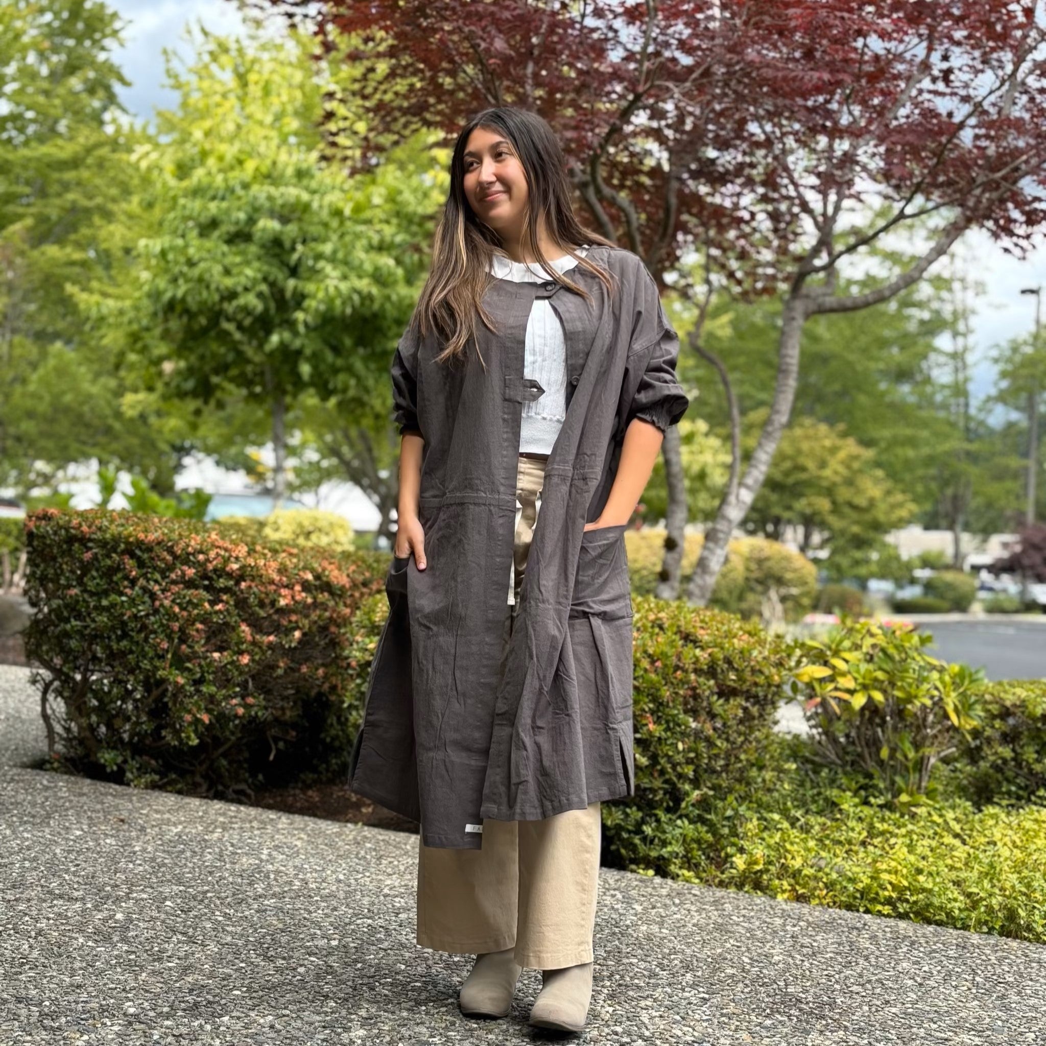 Full-body view of model wearing lightweight 2-way tunic coat, made of crinkled cotton with natural texture-back
