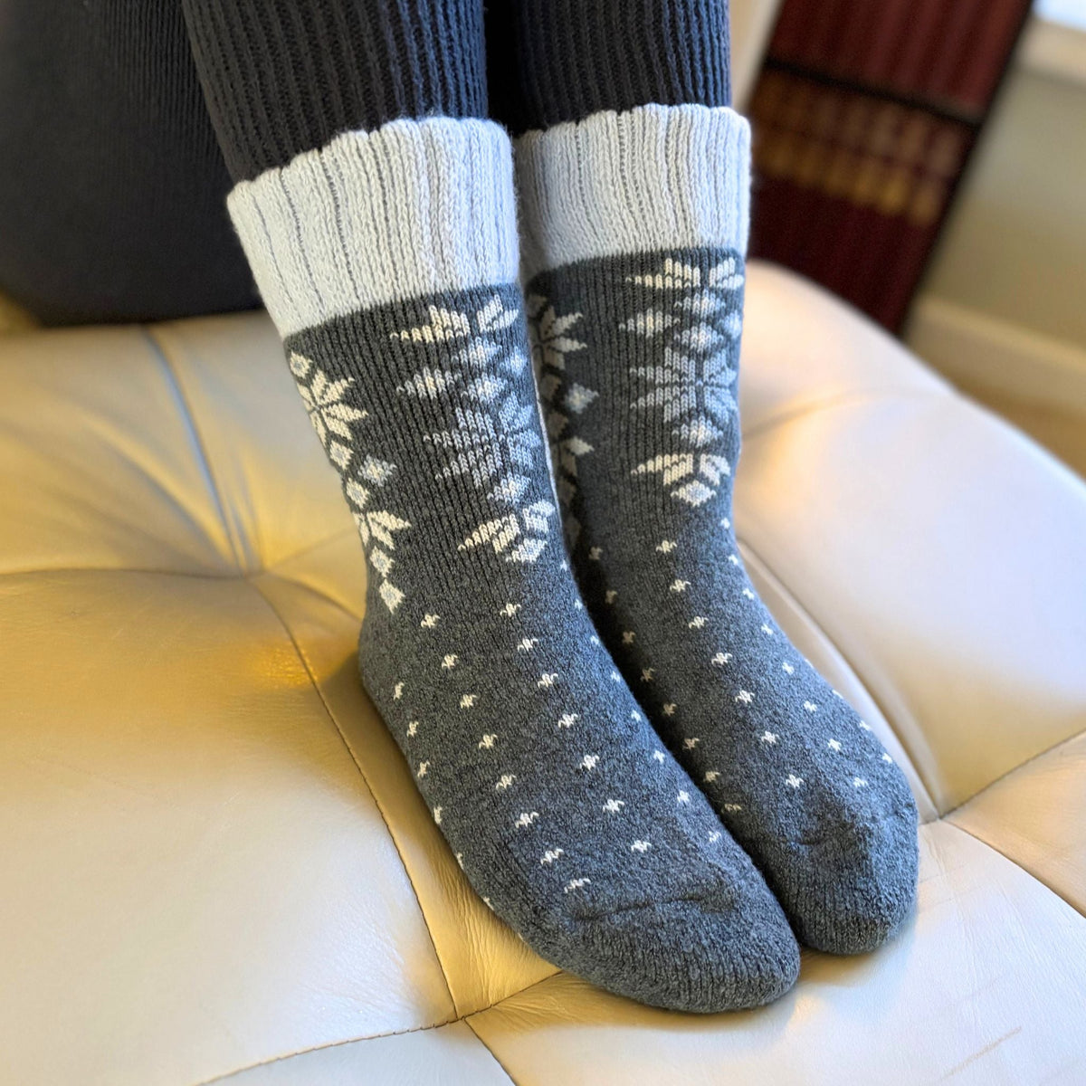 Warm Nordic Slipper Crew Socks made from a merino wool blend with thick ribbed cuffs. The soles feature invisible non-slip grips. 