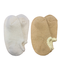 Airy Grace Organic Cotton Slipper Socks with Fuzzy Trim. Moisture-absorbing and heat-retaining properties. Undyed in a natural color, featuring a cozy, double-knit ribbed 