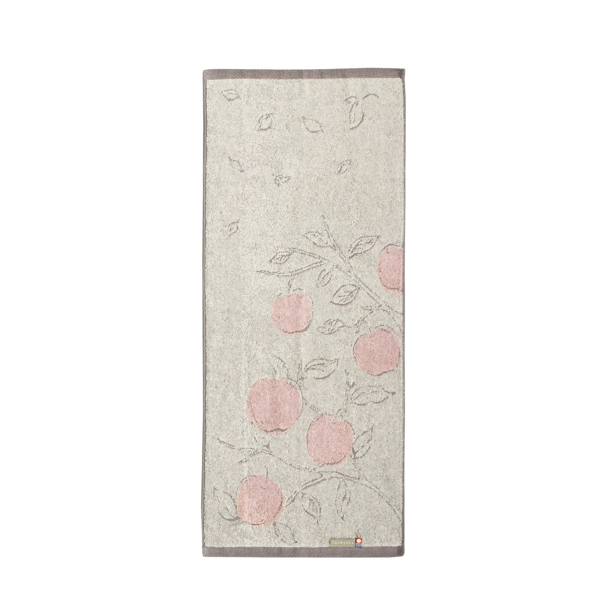 Towel with apples design on a light background