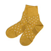 Organic Cotton Blend Polka Dot Everyday Crew Socks offer a soft touch with a stylish pop dot pattern. Designed to stay in place with a special heel design, relaxed fit, and stretchable cuff for added comfort. CHERRYSTONEstyle