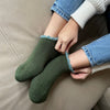 Woman wearning - Thermal Short Slipper Socks Grips Medium. Forest Green. Blend with Merino Wool. Size: Medium (US women's shoe size: 5  - 9)
-CHERRYSTONEstyle