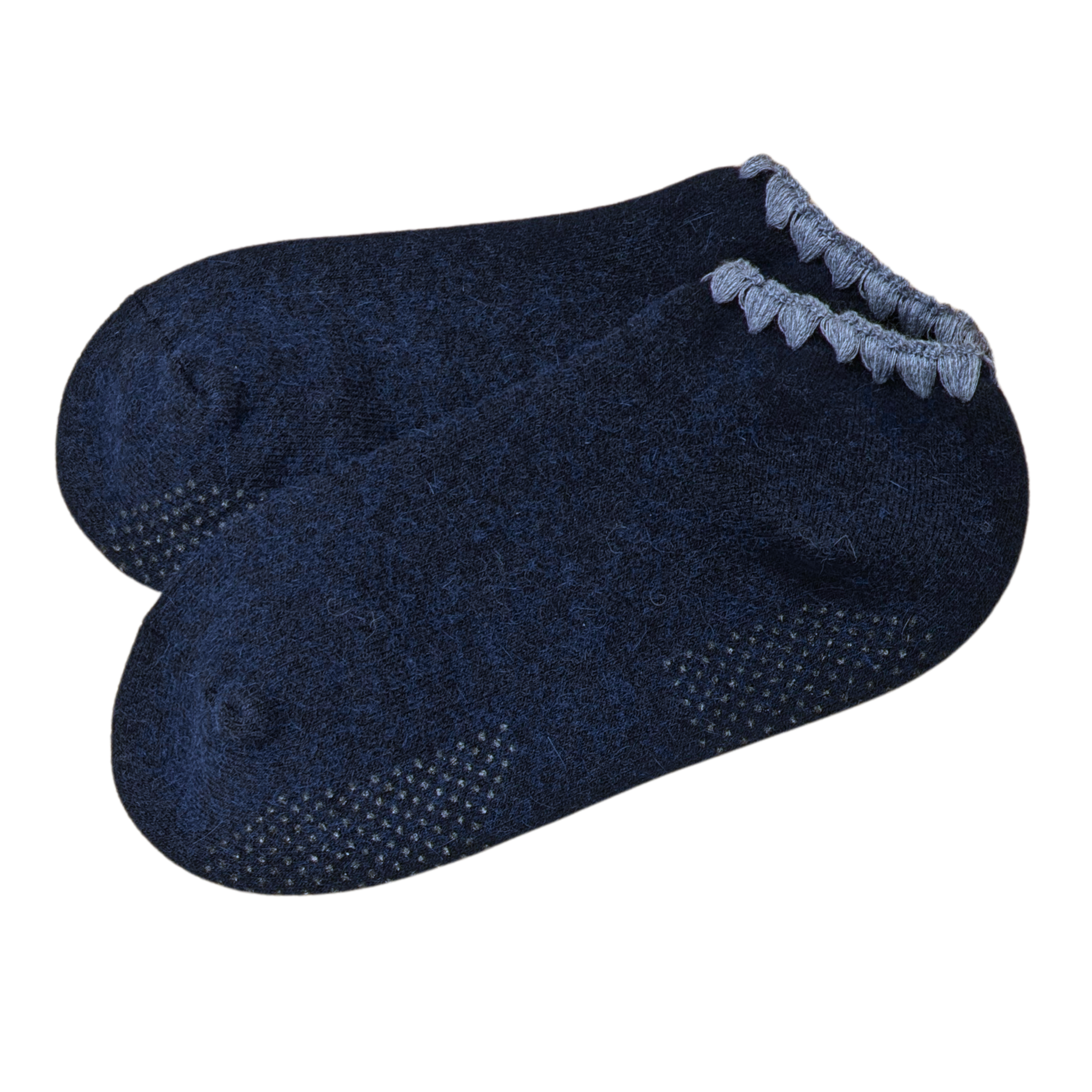 Angora Slipper Socks with anti-slip soles featuring transparent grip dots for extra safety. Each pair is handcrafted, incorporating traditional craftsmanship, and finished with cherrystone shell-shaped embroidery on the sock opening. Soft, cozy, and comfortable for ultimate foot pampering.