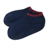 Angora Slipper Socks with anti-slip soles featuring transparent grip dots for extra safety. Each pair is handcrafted, incorporating traditional craftsmanship, and finished with cherrystone shell-shaped embroidery on the sock opening. Soft, cozy, and comfortable for ultimate foot pampering.