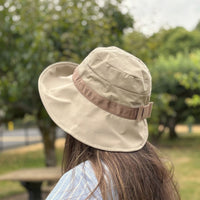 model wearing a khaki easy-hat.