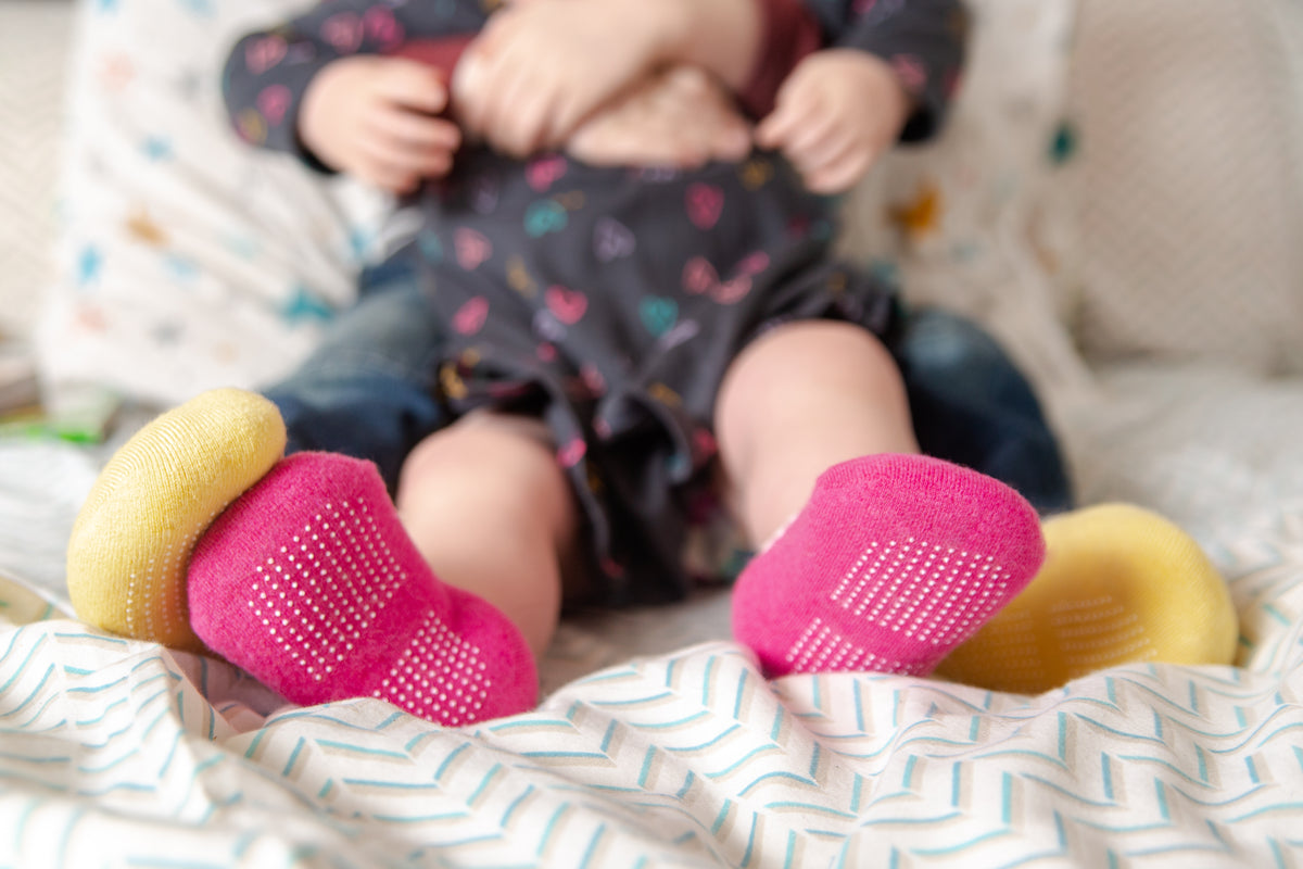 kids are wearing handcrafted slipper socks