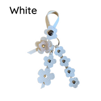 
Snap Leather Flower Charm | Bag Flower Charm | Purse Charm | Keychain | Handmade | Solid Color | 9 Colors - Hand crafted, high-quality glove leather cut into colorful flowers. Easy to attach and remove with a snap button to your favorite bag. CHERRYSTONEstyle