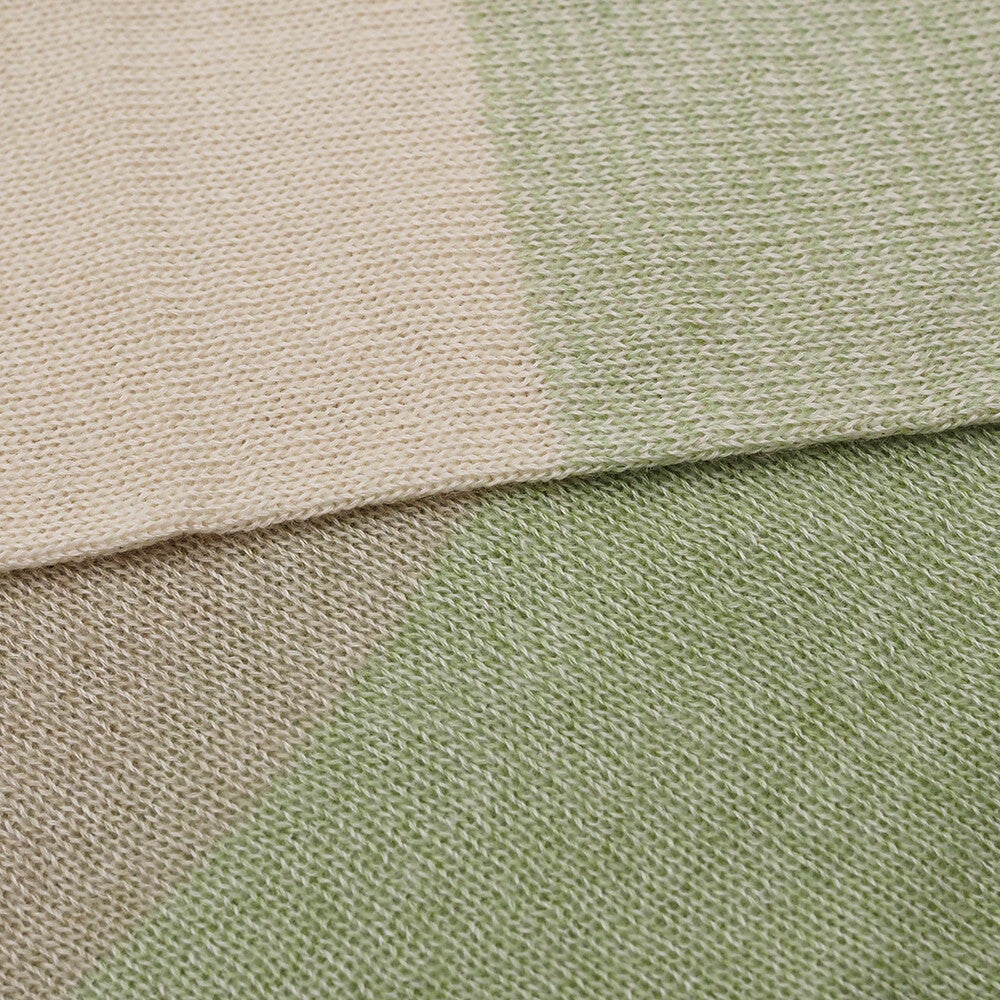 Close-up of beige and green fabric swatches