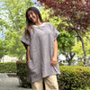 Lightweight 2-way tunic shirt with ripple-textured cotton, shown on model front view for everyday wear or apron style.