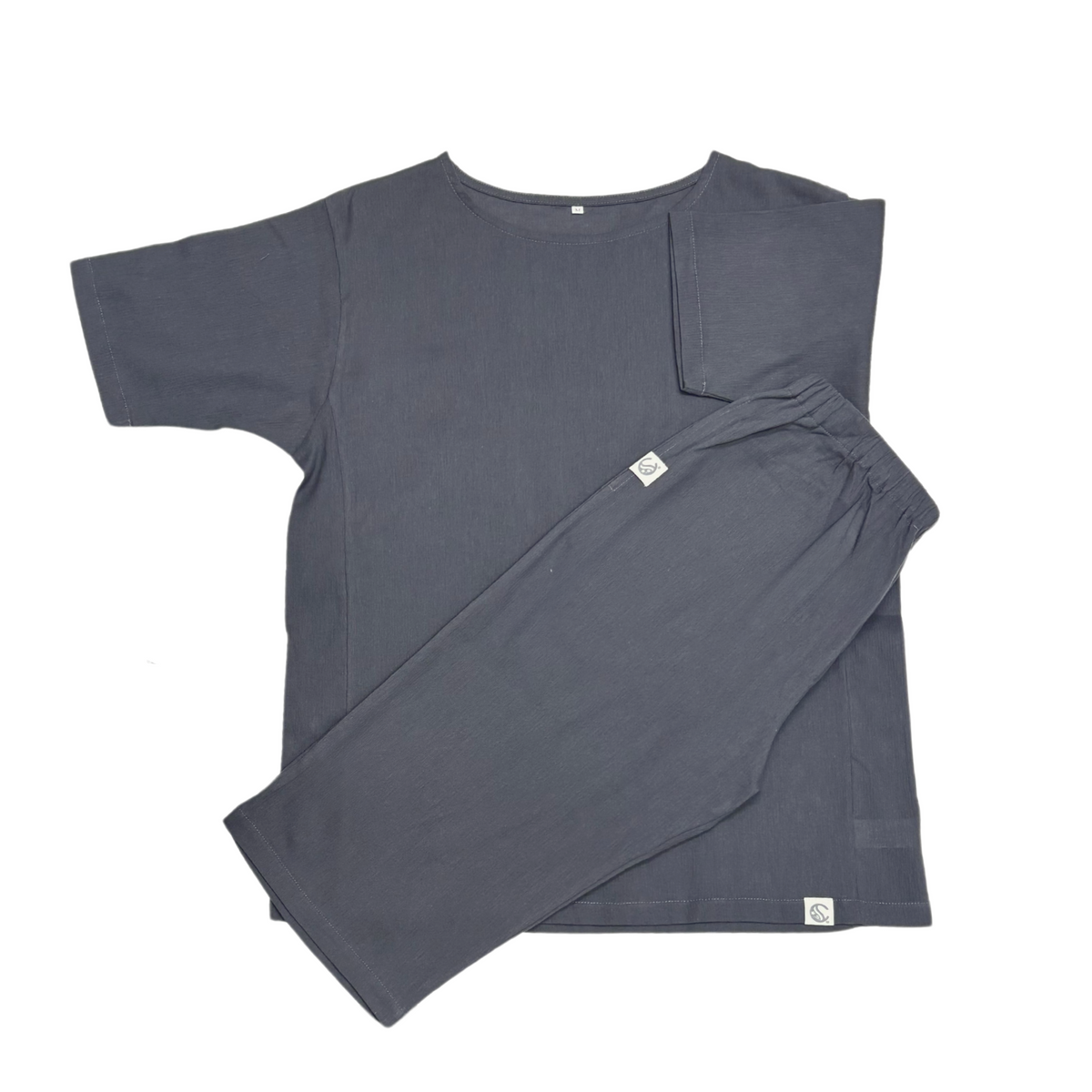 Our Cool, Stretchy, Comfy Lounge Pants and T-shirt Set made from 100% cotton with Japanese-inspired woven fabric. Breathable, sweat-absorbing with a dry-touch texture. Pants have pockets and adjustable waist, T-shirt is moisture-wicking with an A-line cut for easy movement. Travel-friendly, lightweight, and compact—perfect for home relaxation and travel-friendly. 
CHERRYSTONEstyle