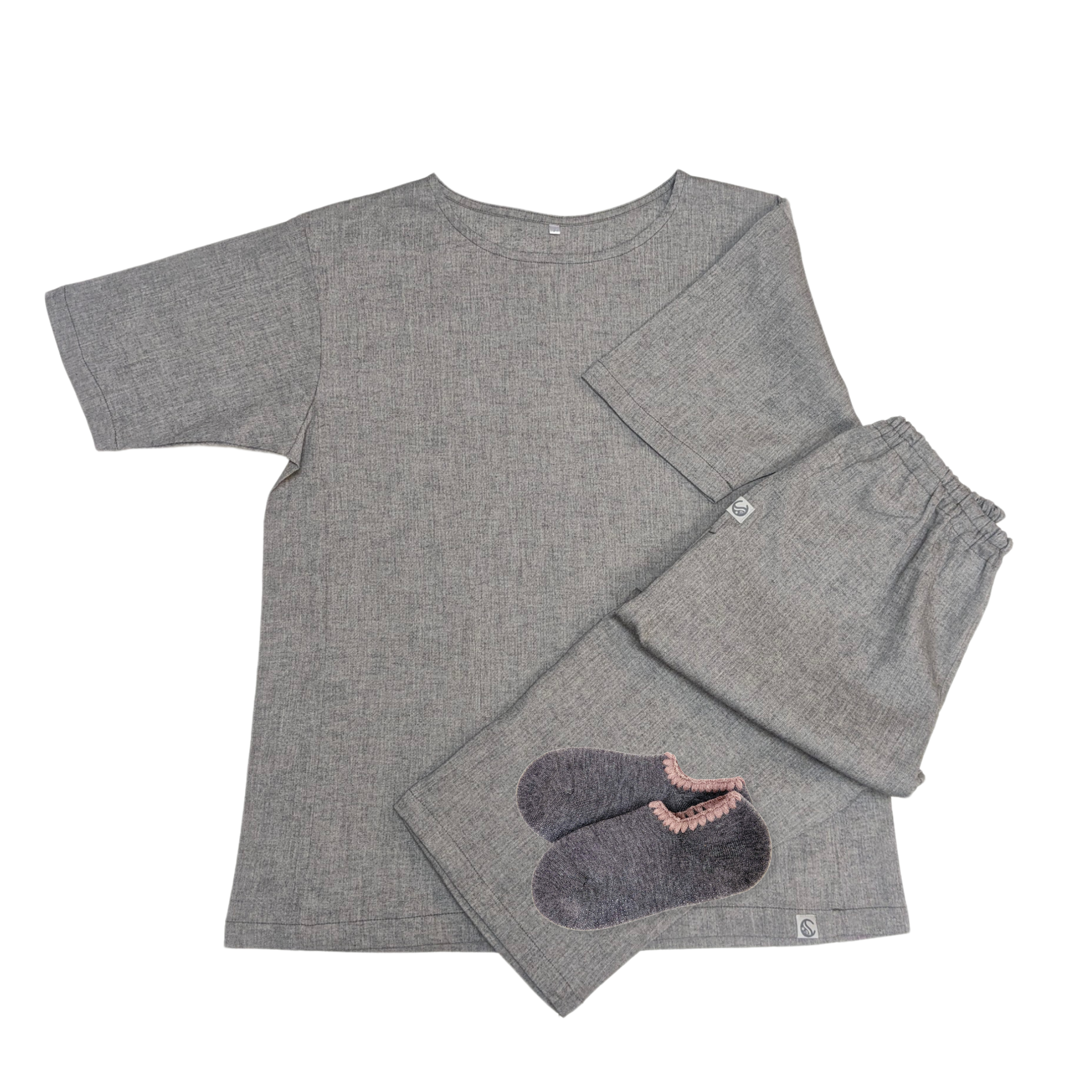 A cozy Special Gift Set featuring a Lounge T-Shirt & Pants paired with Handcrafted Wool Slipper Socks. The wool socks showcase a unique cherrystone shell-shaped embroidery on the cuff, blending traditional craftsmanship with a warm, handmade feel. The Lounge T-Shirt & Pants are crafted for comfort, with breathable cotton pants and a relaxed A-line T-shirt for effortless mobility and comfort. A perfect blend of style and relaxation, ideal for lounging or a restful night's sleep.
CHERRYSTONEstyle