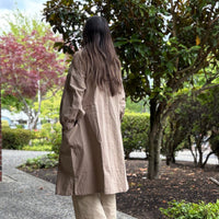 Full-body view of model wearing lightweight 2-way tunic coat, made of crinkled cotton with natural texture-back