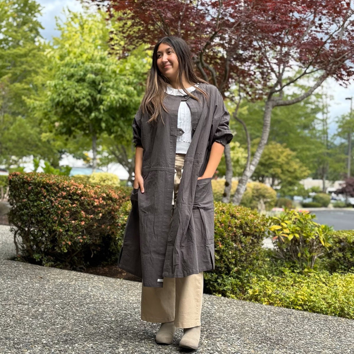 Full-body view of model wearing lightweight 2-way tunic coat, made of crinkled cotton with natural texture-back