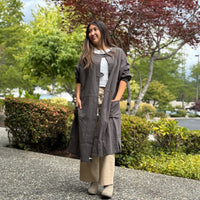 Full-body view of model wearing lightweight 2-way tunic coat, made of crinkled cotton with natural texture-back