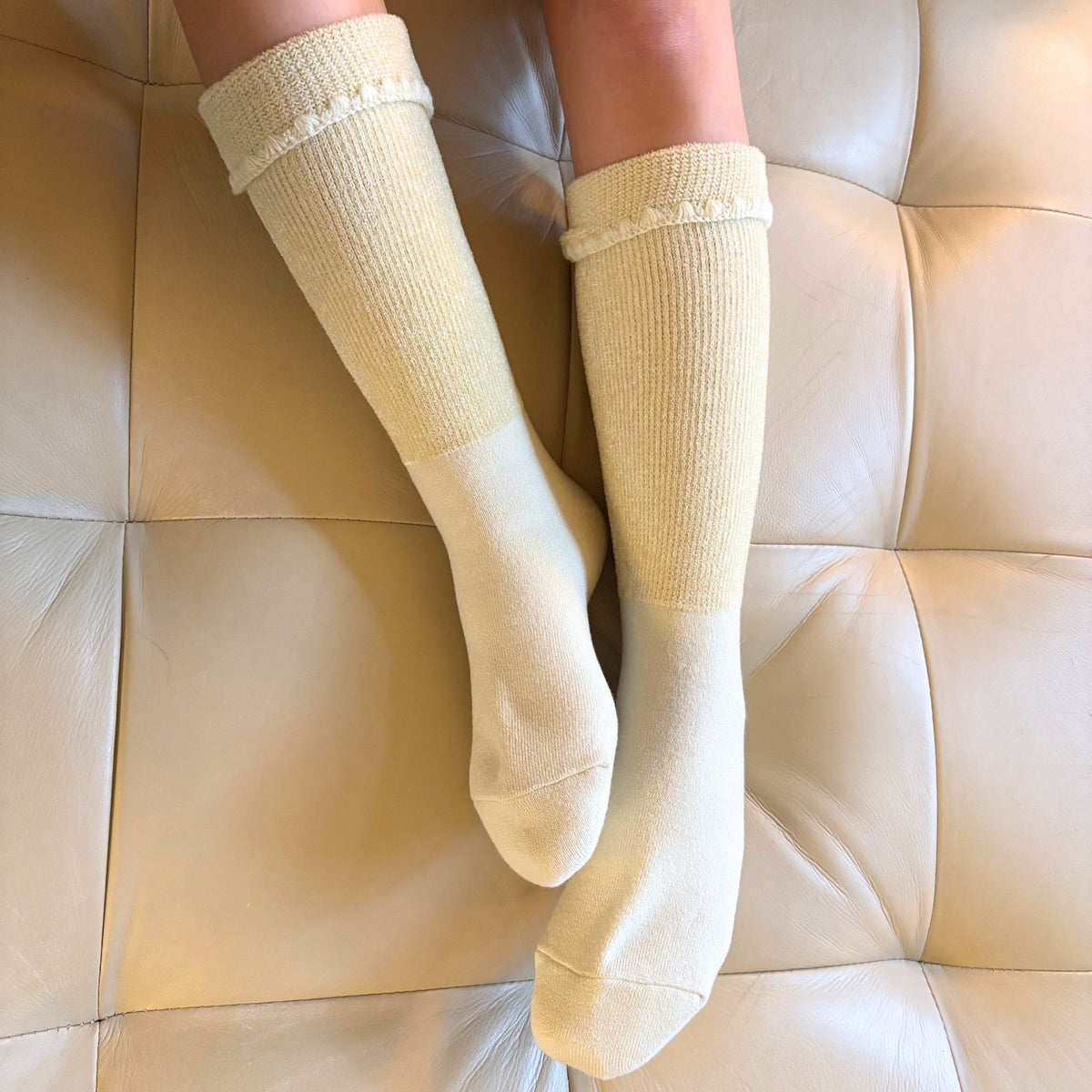 Cozy handcrafted wool knee-high socks featuring plush cushioning and refined embroidery. CHERRYSTONEstyle
