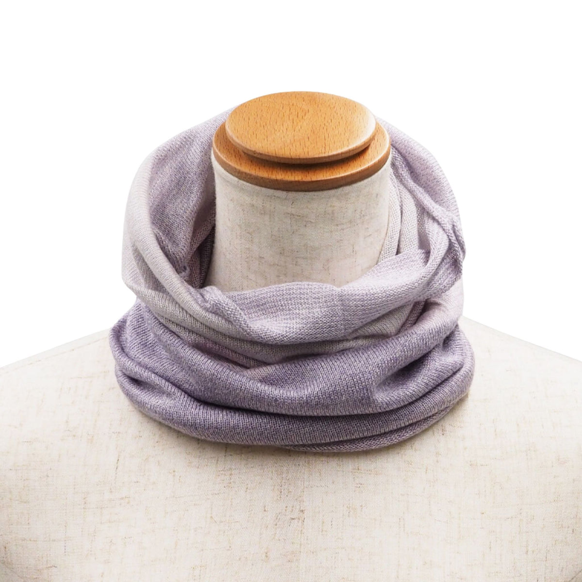 Purple scarf on a mannequin with a white background
