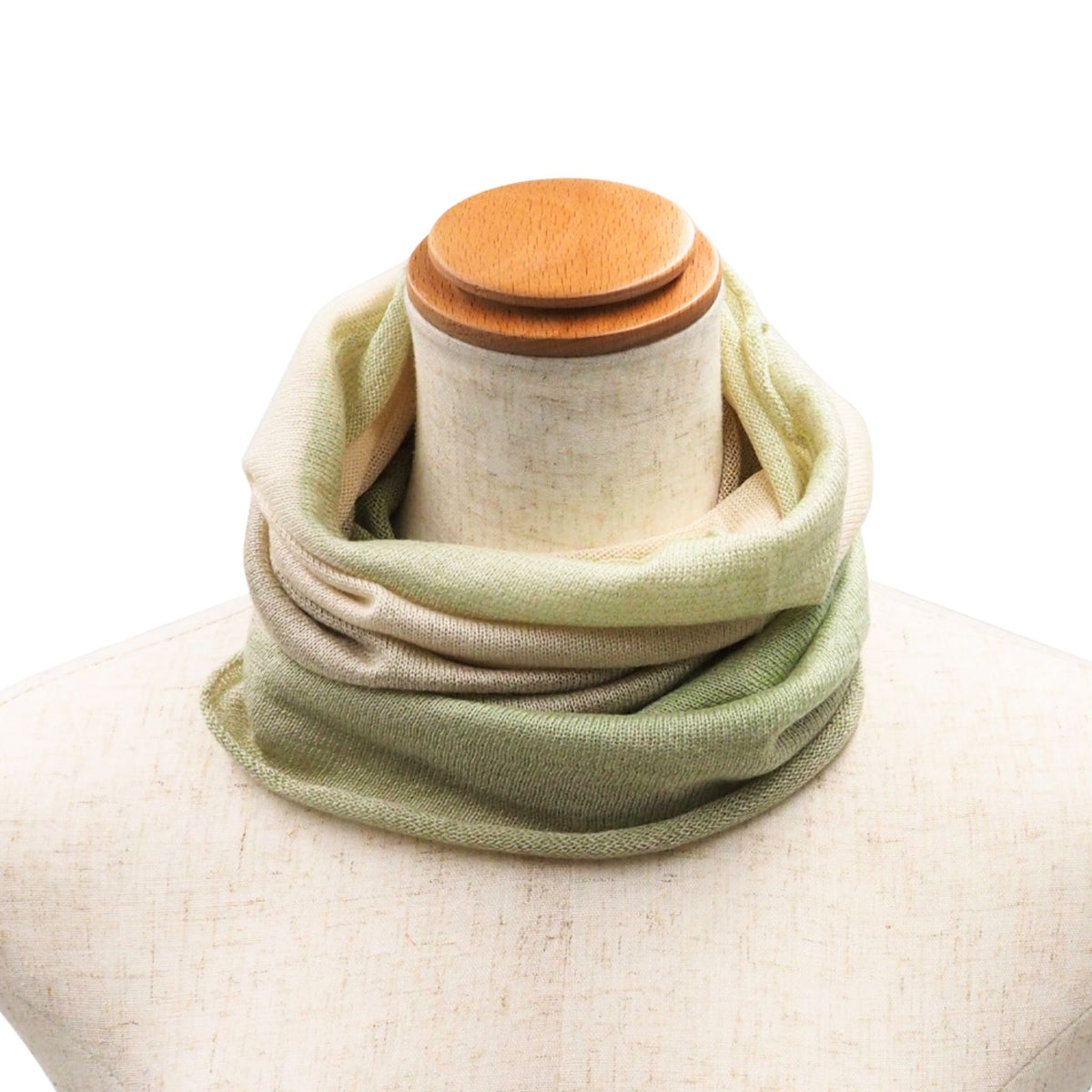 Light Green Neck warmer on a mannequin with a white background