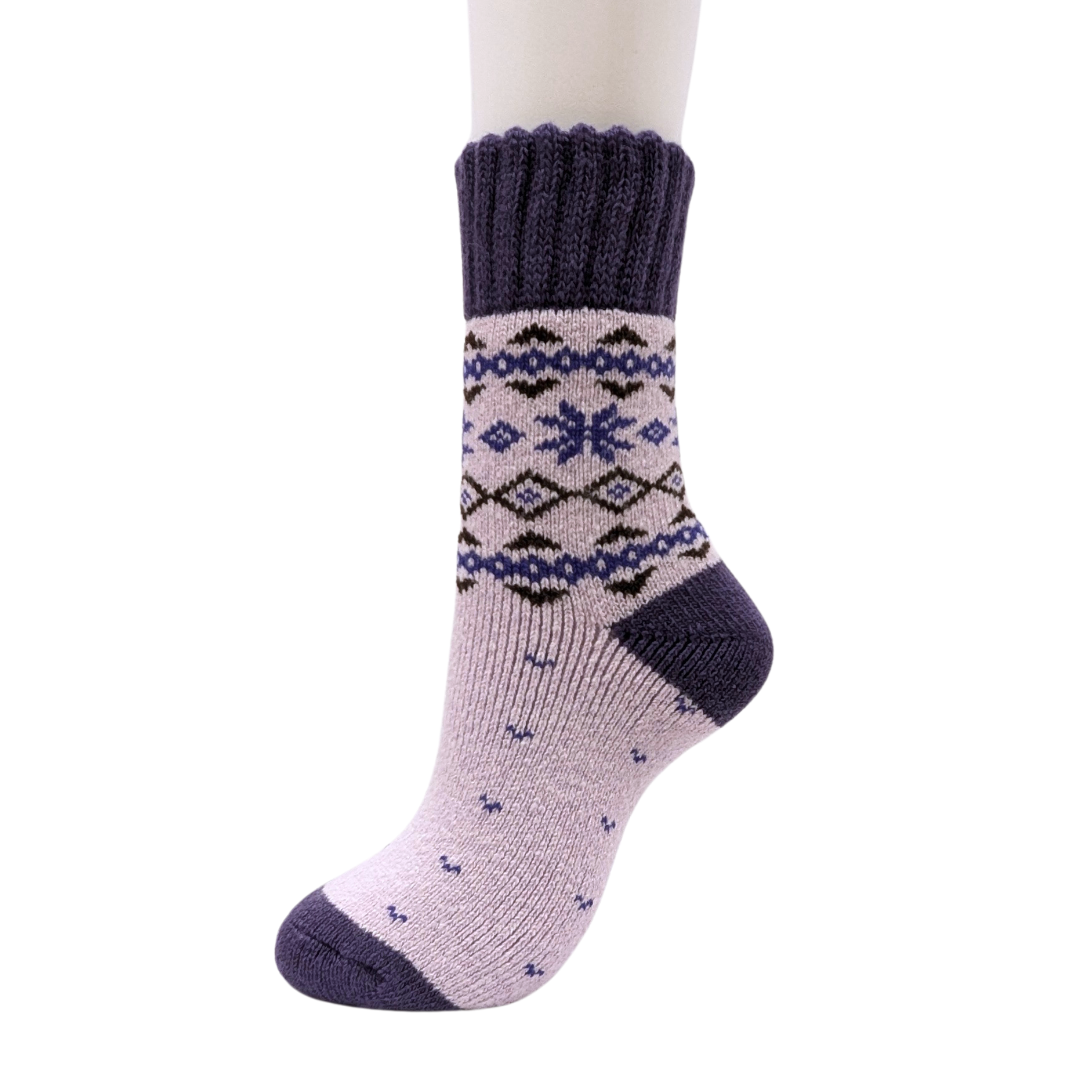 Warm Nordic Slipper Crew Socks made from a merino wool blend with thick ribbed cuffs to block cold air and a brushed lining for added cushioning. The soles feature invisible non-slip grips. Available in four stylish colors, perfect as a gift or for cozy days at home.