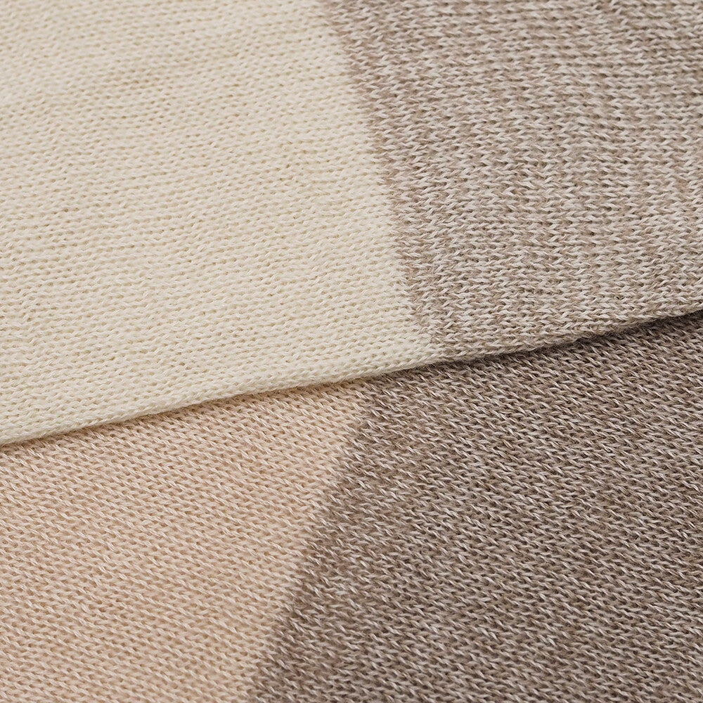 Close-up of beige and brown fabric swatches