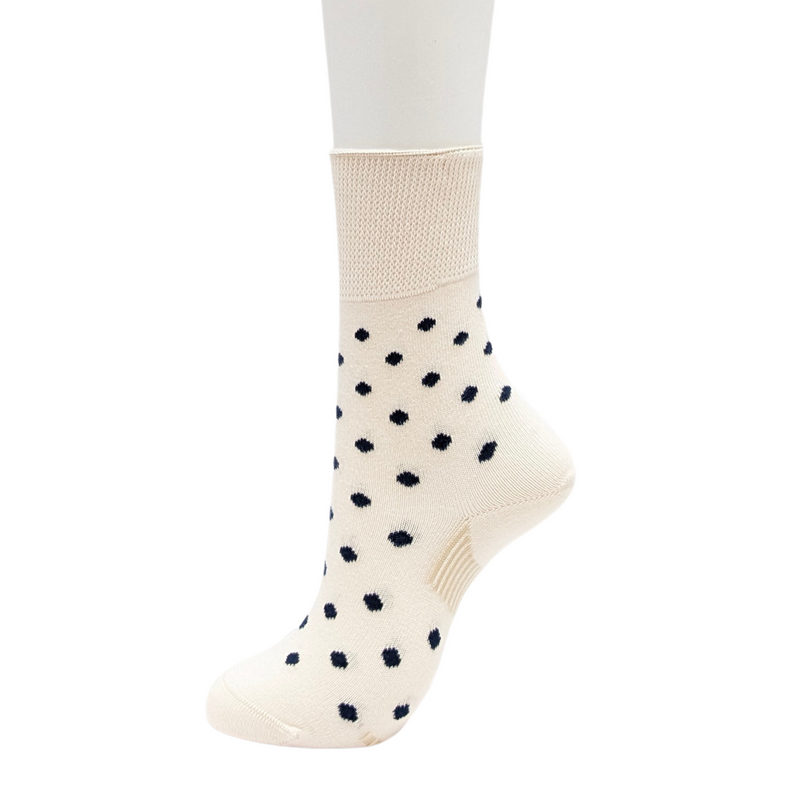 Organic Cotton Blend Polka Dot Everyday Crew Socks offer a soft touch with a stylish pop dot pattern. Designed to stay in place with a special heel design, relaxed fit, and stretchable cuff for added comfort. CHERRYSTONEstyle