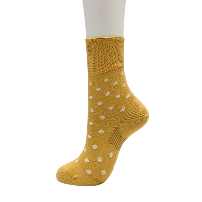 Organic Cotton Blend Polka Dot Everyday Crew Socks offer a soft touch with a stylish pop dot pattern. Designed to stay in place with a special heel design, relaxed fit, and stretchable cuff for added comfort. CHERRYSTONEstyle