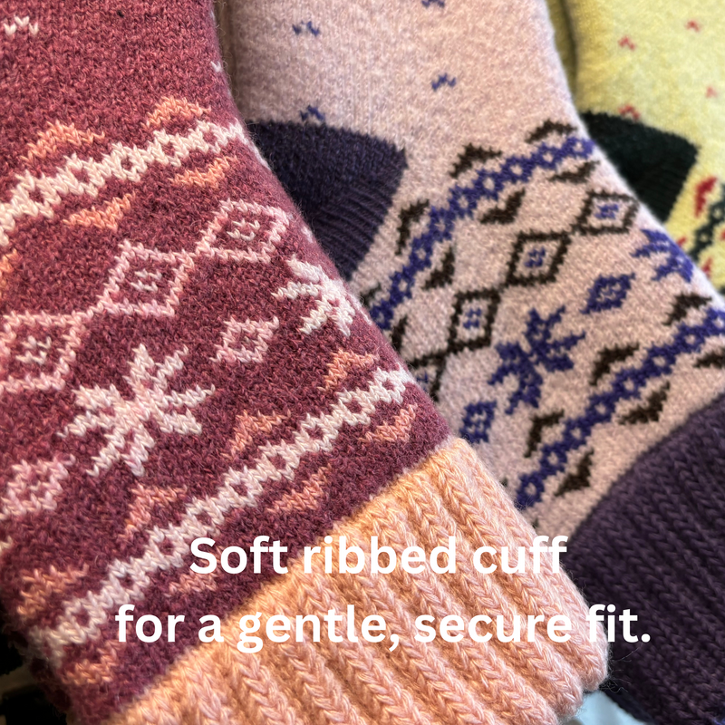 Warm Nordic Slipper Crew Socks made from a merino wool blend with thick ribbed cuffs to block cold air and a brushed lining for added cushioning. The soles feature invisible non-slip grips. Available in four stylish colors, perfect as a gift or for cozy days at home.