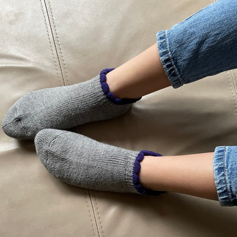 Thermal Soft-Opening Short Slipper Socks | With Grips | Large. Stylish wool blend slipper socks with plush cushioning and heat-retaining brushed inner pile. Soft outer, secure grips on the soles, and fluffy trim for added comfort. Perfect gift ideas.
