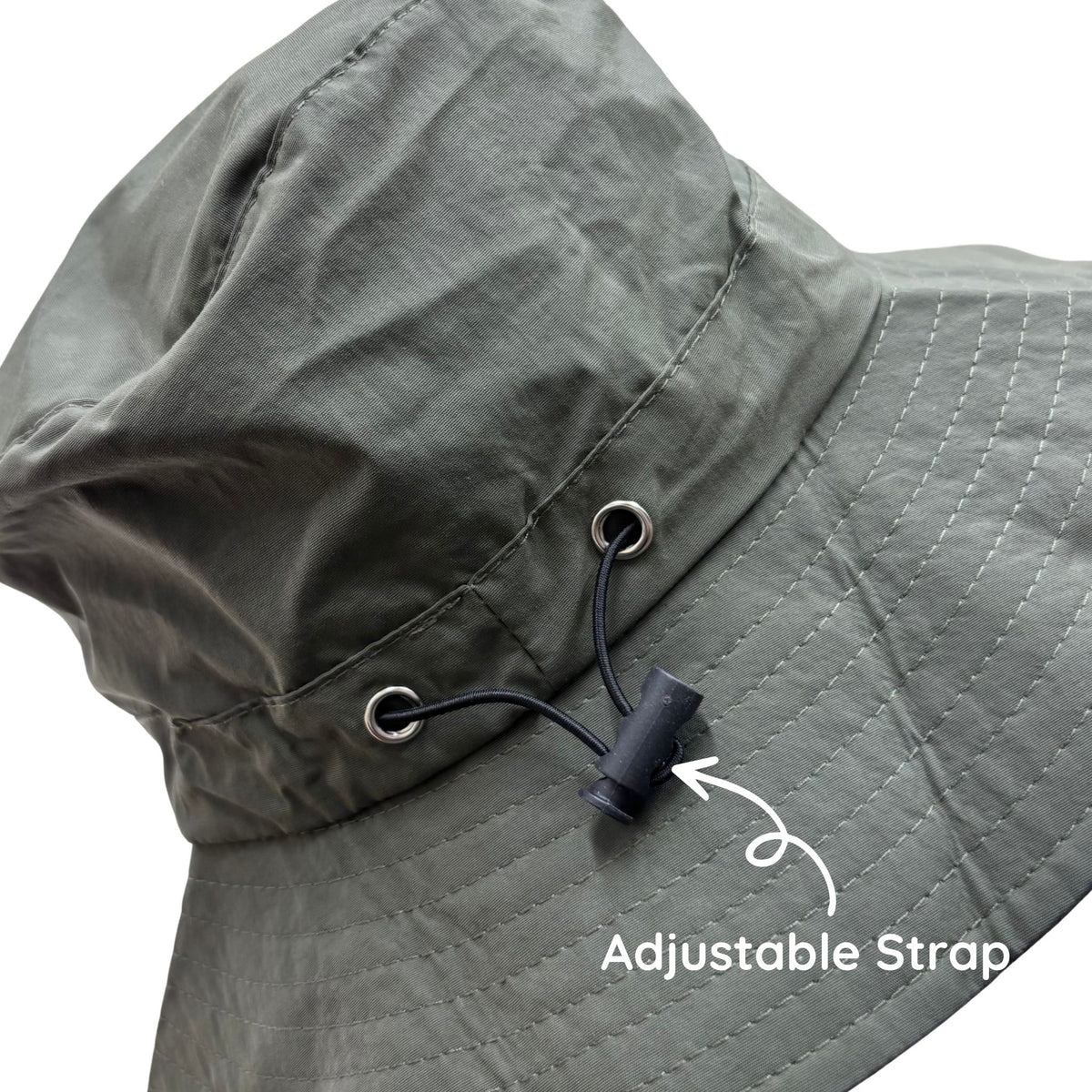 Gray bucket hat with an adjustable strap on a white background