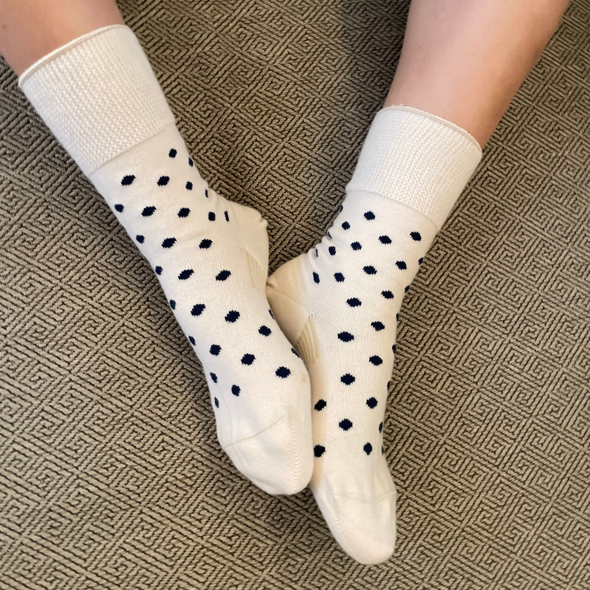 Organic Cotton Blend Polka Dot Everyday Crew Socks offer a soft touch with a stylish pop dot pattern. Designed to stay in place with a special heel design, relaxed fit, and stretchable cuff for added comfort. CHERRYSTONEstyle