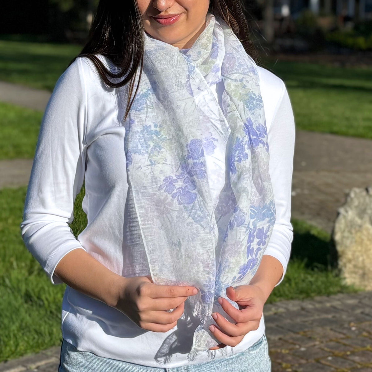 Woman wearing a floral scarf outdoors
