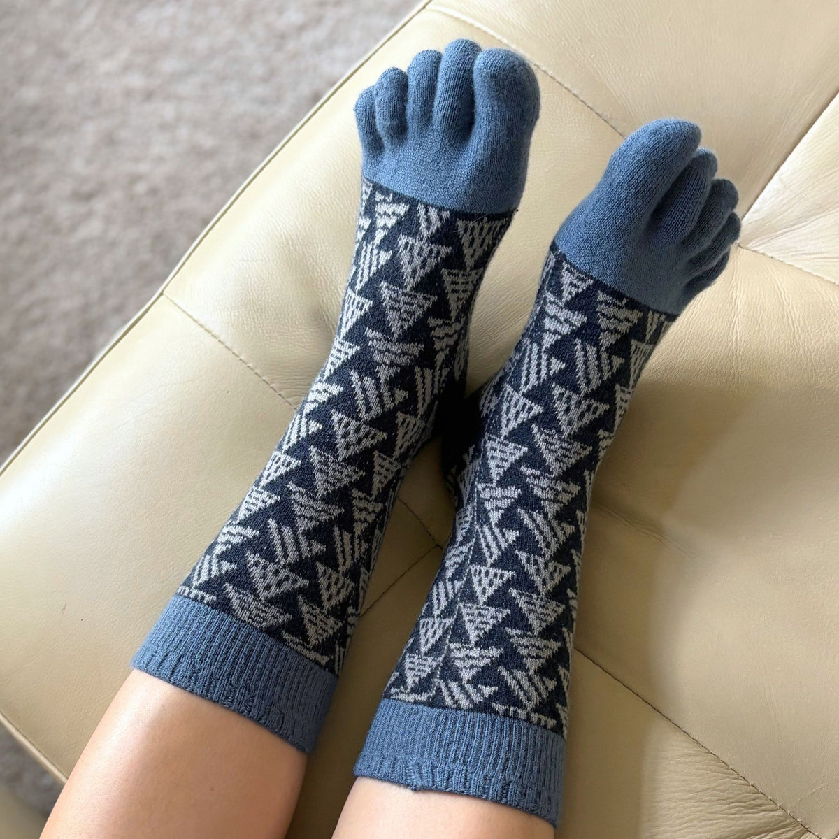 model wearing navy toe socks