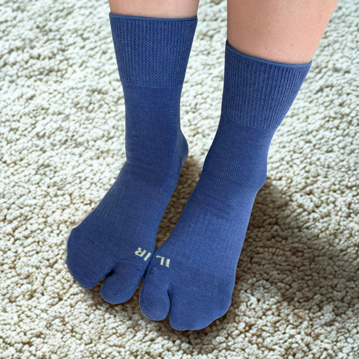 Cotton blend tabi socks with a traditional split-toe design, denim