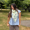 woman wearing a yellow summer scarf upf30 citrus design.