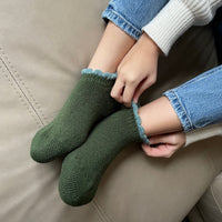 Thermal Soft-Opening Short Slipper Socks | With Grips | Large. Stylish wool blend slipper socks with plush cushioning and heat-retaining brushed inner pile. Soft outer, secure grips on the soles, and fluffy trim for added comfort. Perfect gift ideas.